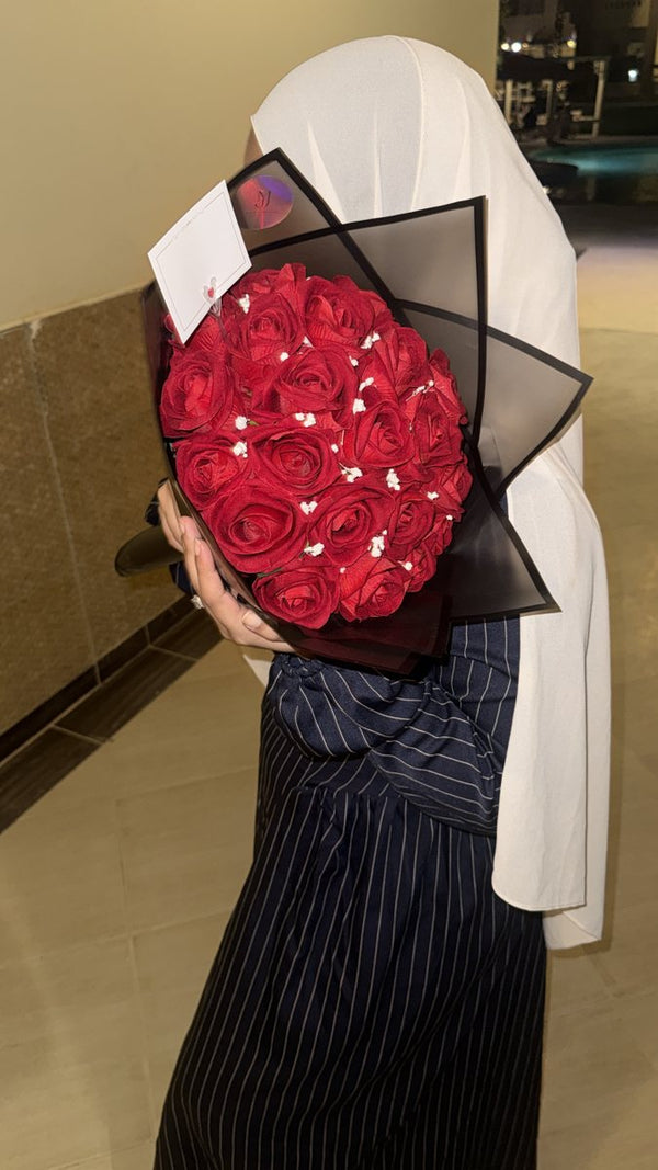 Bouquet tenu dans les bras
